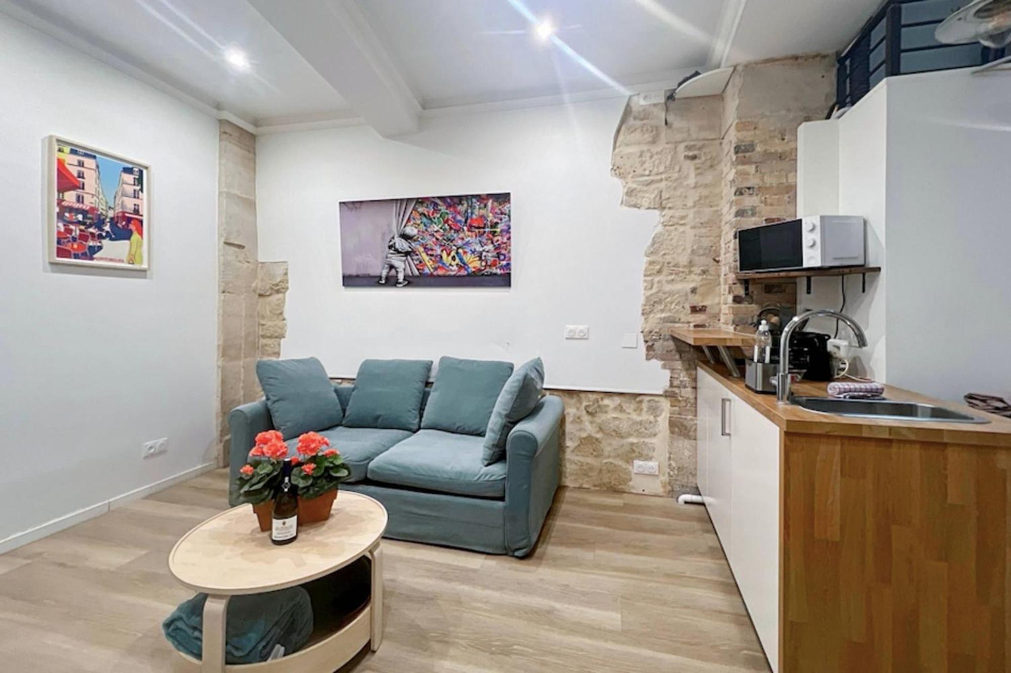 Ideally Located And Atypical Apartment In Paris Bagian luar foto